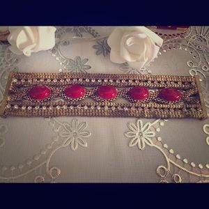 Gold with red stones bracelet